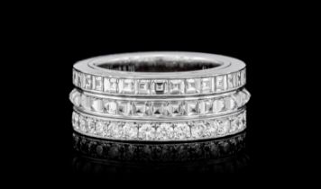 Piaget, Possession, bague or gris 750 composée de trois anneaux mobiles pavés de diamants