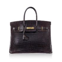 Hermès, sac Birkin 35 en crocodile shiny havane cognac, 2005, bouclerie plaquée or, tirette clochett