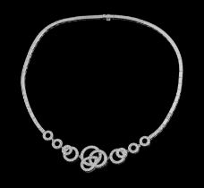Boucheron, collier or gris 750 dont le centre à motif circulaire ajouré est pavé de diamants taille