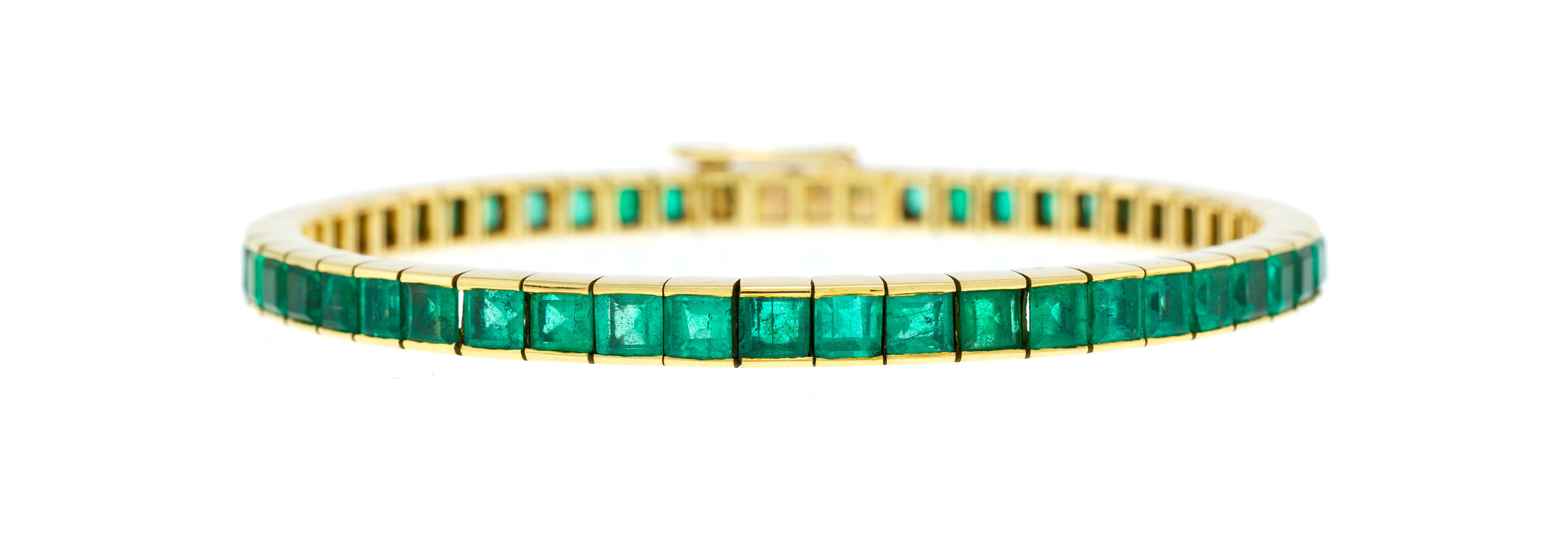 Cartier, bracelet rivière or 750 serti d'émeraudes carrées en double chute, boîte