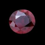 Un rubis taille ovale sur papier 3.175 carats, rapport SSEF