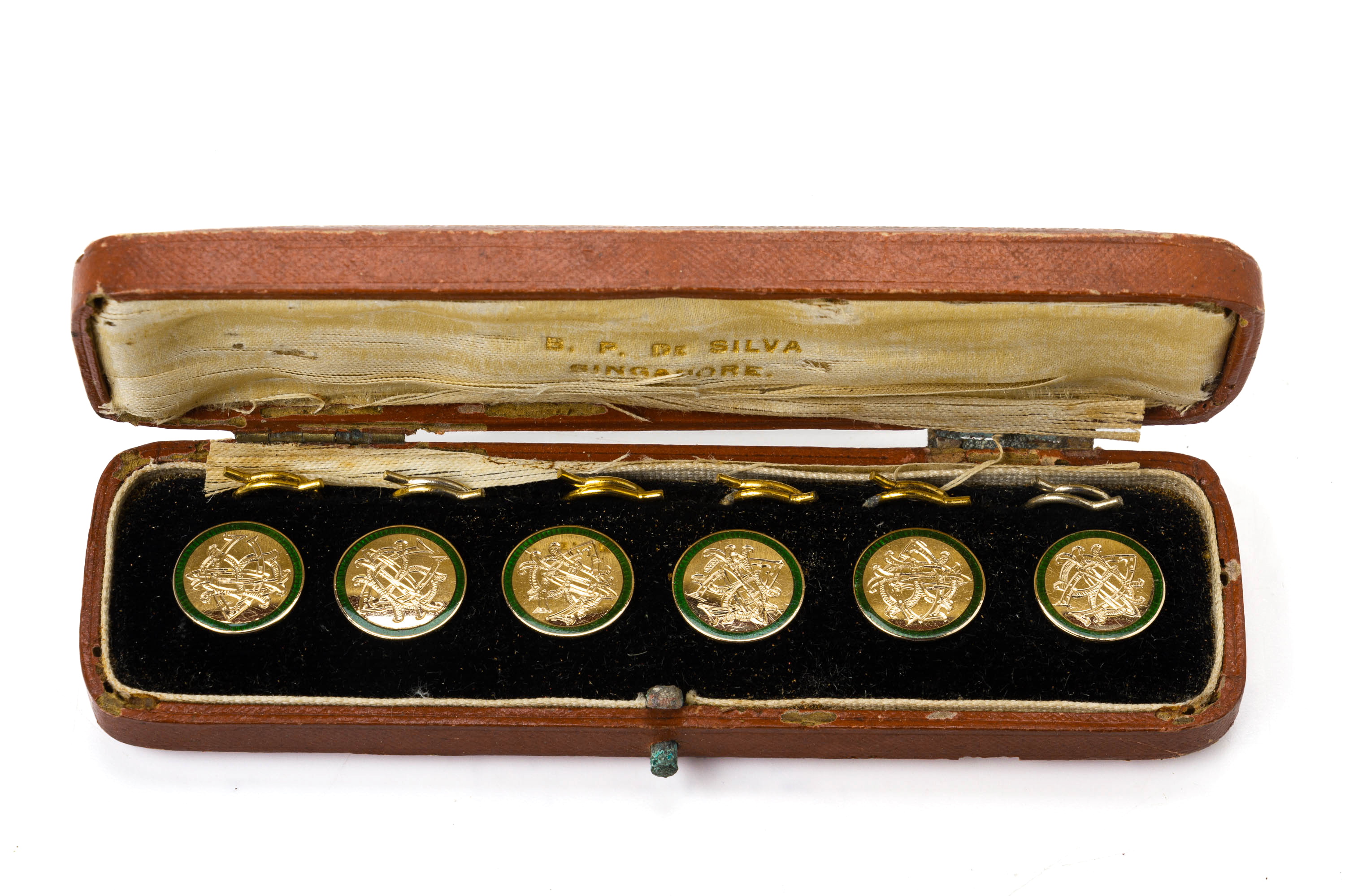 A SET OF SIX 9K GOLD AND ENAMEL BUTTONS