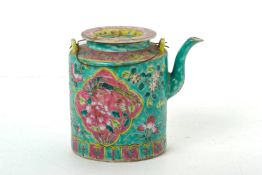 A TURQUOISE GROUND FAMILLE ROSE CYLINDRICAL TEAPOT