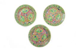 A SET OF THREE PINK GROUND FAMILLE ROSE PLATES