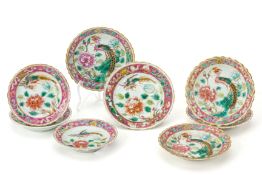 A GROUP OF EIGHT FAMILLE ROSE 'PHOENIX' PLATES