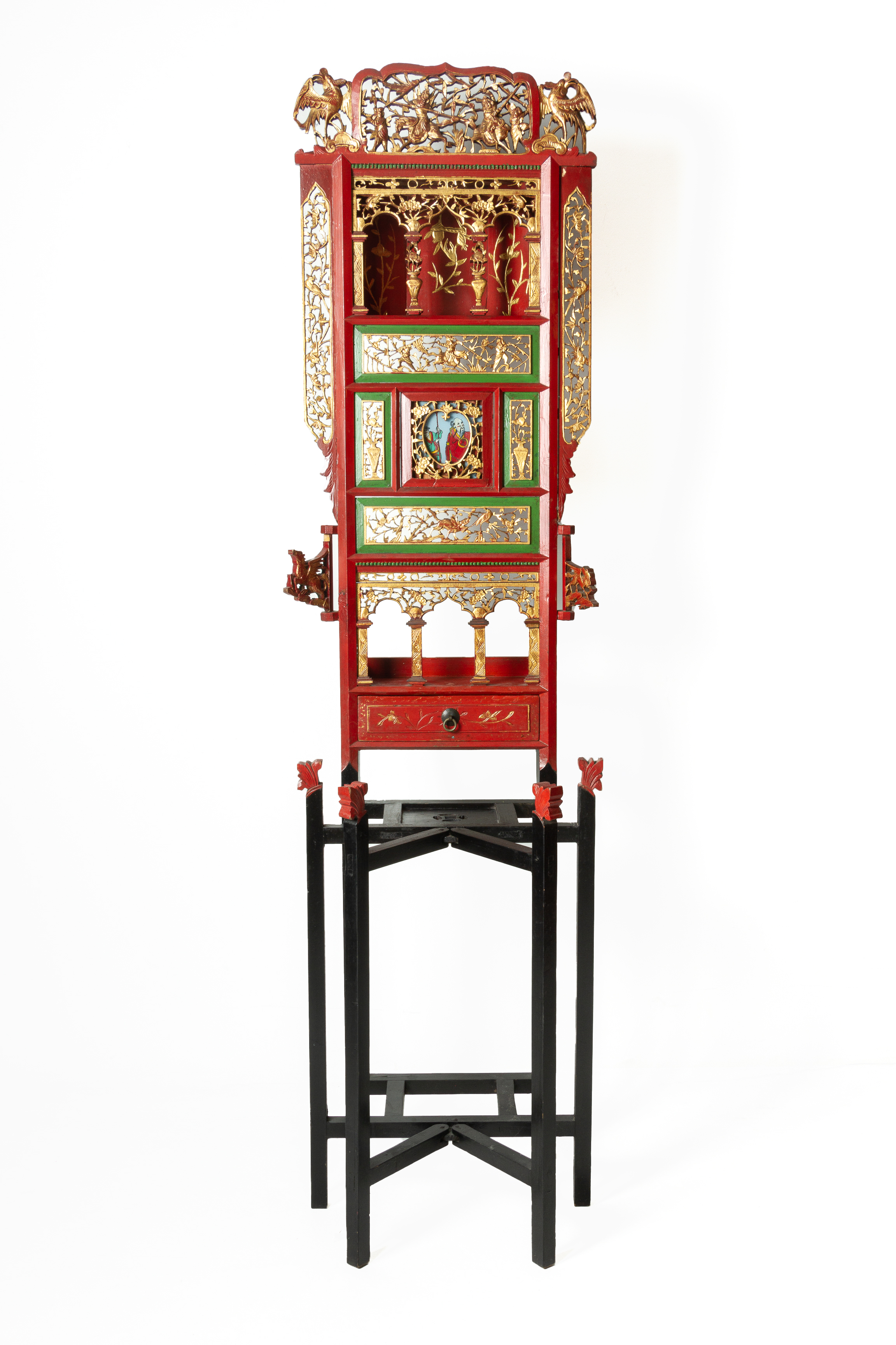 A CARVED PARCEL GILT AND RED WASH STAND