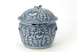 A BLUE AND WHITE ‘SWEET PEA’ JAR AND COVER