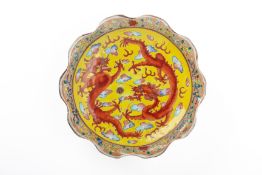 A YELLOW GROUND 'DRAGONS CHASING A PEARL' OFFERING DISH