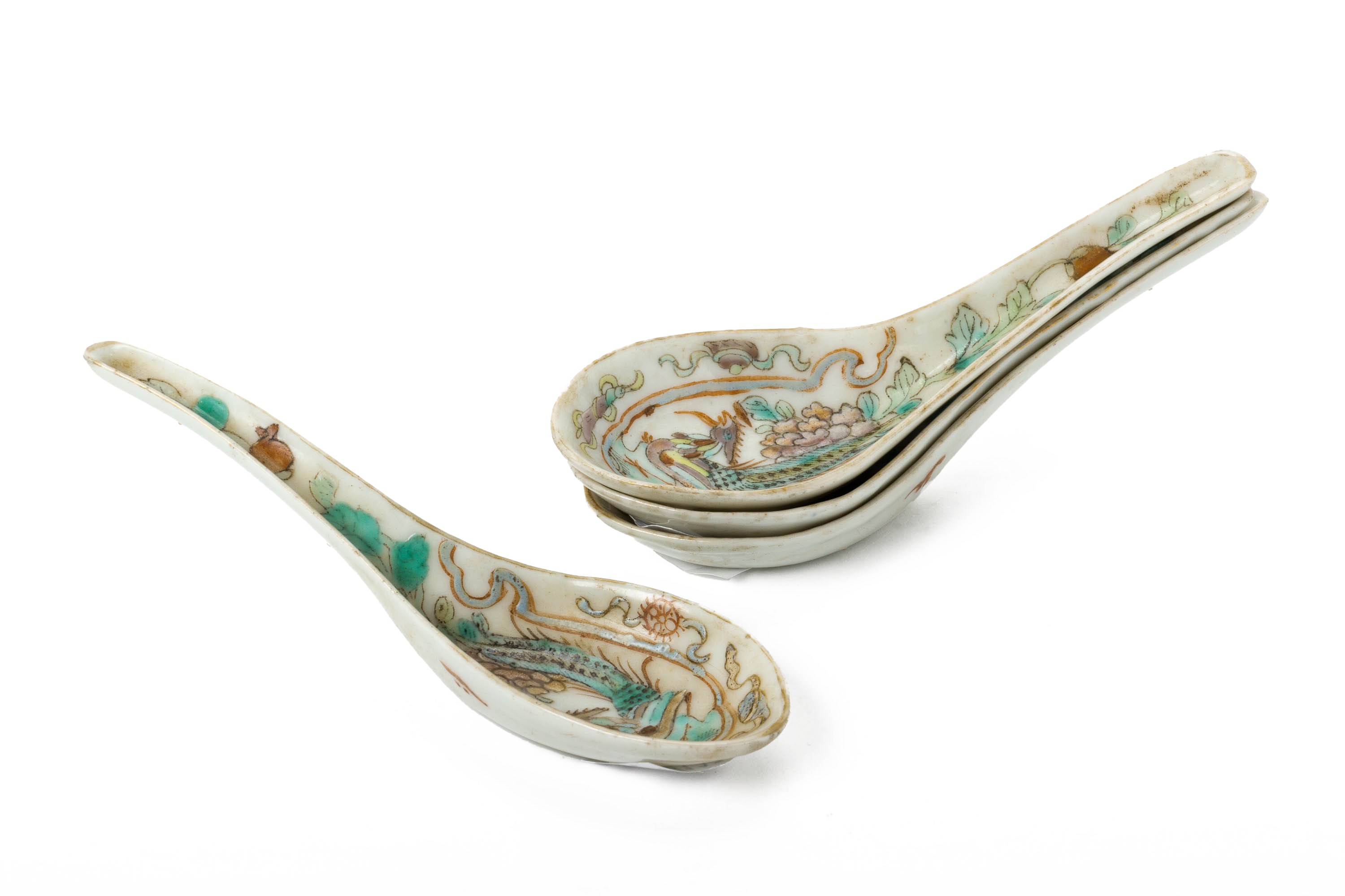 A SET OF FOUR FAMILLE ROSE 'PHOENIX' SPOONS