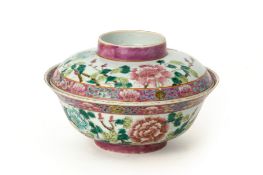 A PERANAKAN WHITE GROUND FAMILLE ROSE BOWL AND COVER