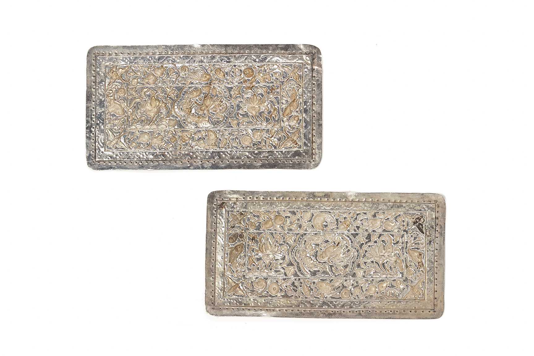 A PAIR OF REPOUSSE SILVER PILLOW ENDS - Image 3 of 3