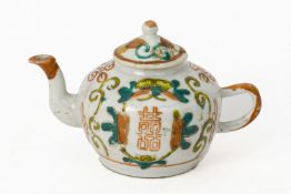 A GLOBULAR SHAPED PORCELAIN TEAPOT