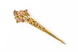 A PINK SAPPHIRE PIN BROOCH