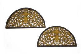 A PAIR OF ARCHED CARVED AND PIERCED WOOD PANELS