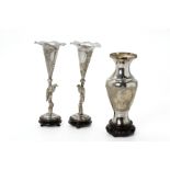 A PAIR OF SILVER PLATED TRUMPET VASES AND A BALUSTER VASE