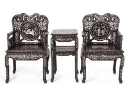 A PAIR OF MOTHER OF PEARL INLAID BLACKWOOD CHAIRS AND TABLE