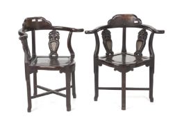 A PAIR OF MARBLE INSET BLACKWOOD CORNER CHAIRS