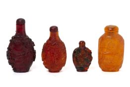 A GROUP OF FOUR AMBER TYPE SNUFF BOTTLES