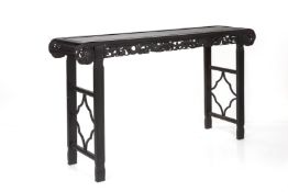 A CARVED BLACKWOOD ALTAR TABLE