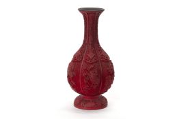 A CHINESE CARVED CINNABAR LACQUER LOBED BALUSTER VASE