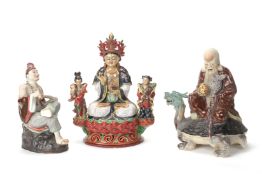 THREE POLYCHROME DECORATED PORCELAIN FIGURAL GROUPS