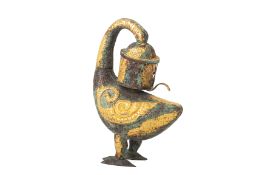 A CHINESE COPPER GILT MYTHICAL BIRD LAMP