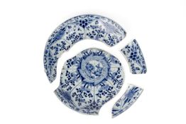 A BLUE AND WHITE PORCELAIN CHARGER (FOR RESTORATION)