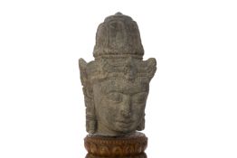 A JAVANESE VOLCANIC STONE HEAD OF A BODDHISATTVA