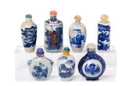 A GROUP OF SEVEN BLUE AND WHITE PORCELAIN SNUFF BOTTLES
