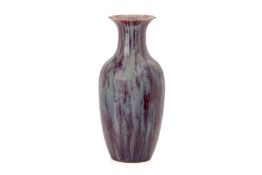 A FLAMBE GLAZED BALUSTER VASE