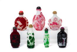 A GROUP OF SEVEN OVERLAID GLASS SNUFF BOTTLES