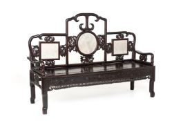 A MARBLE INSET BLACKWOOD SETTEE