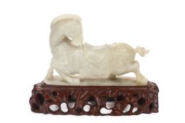 A JADE CARVING OF A HORSE