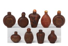 A GROUP OF NINE YIXING POTTERY SNUFF BOTTLES