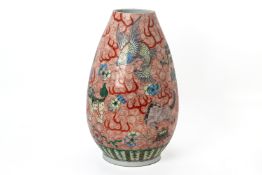 A FAMILLE VERTE AND IRON RED MYTHICAL BEASTS VASE