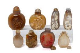A GROUP OF EIGHT AGATE AND HARDSTONE SNUFF BOTTLES