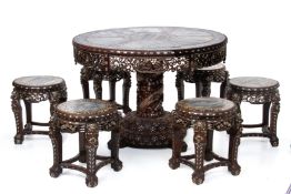 A MOTHER OF PEARL INLAID AND MARBLE INSET TABLE AND 6 STOOLS