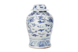 A BLUE AND WHITE PORCELAIN DRAGON JAR AND COVER