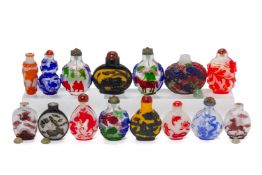 A GROUP OF FIFTEEN OVERLAID GLASS SNUFF BOTTLES