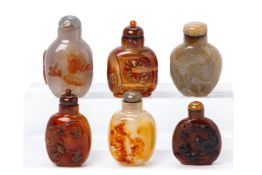 A GROUP OF SIX CARVED AGATE SNUFF BOTTLES