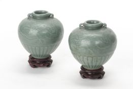 A NEAR PAIR OF SMALL SONG STYLE CELADON JARS