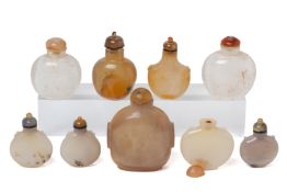 A GROUP OF NINE AGATE AND HARDSTONE SNUFF BOTTLES