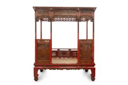 A CHINESE RED LACQUER AND PARCEL GILT OPIUM BED