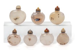 A GROUP OF SEVEN AGATE SNUFF BOTTLES