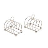 A PAIR OF CHINESE EXPORT SILVER TOAST RACKS