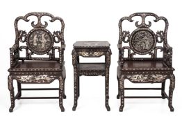TWO MOTHER OF PEARL INLAID BLACKWOOD CHAIRS AND TABLE