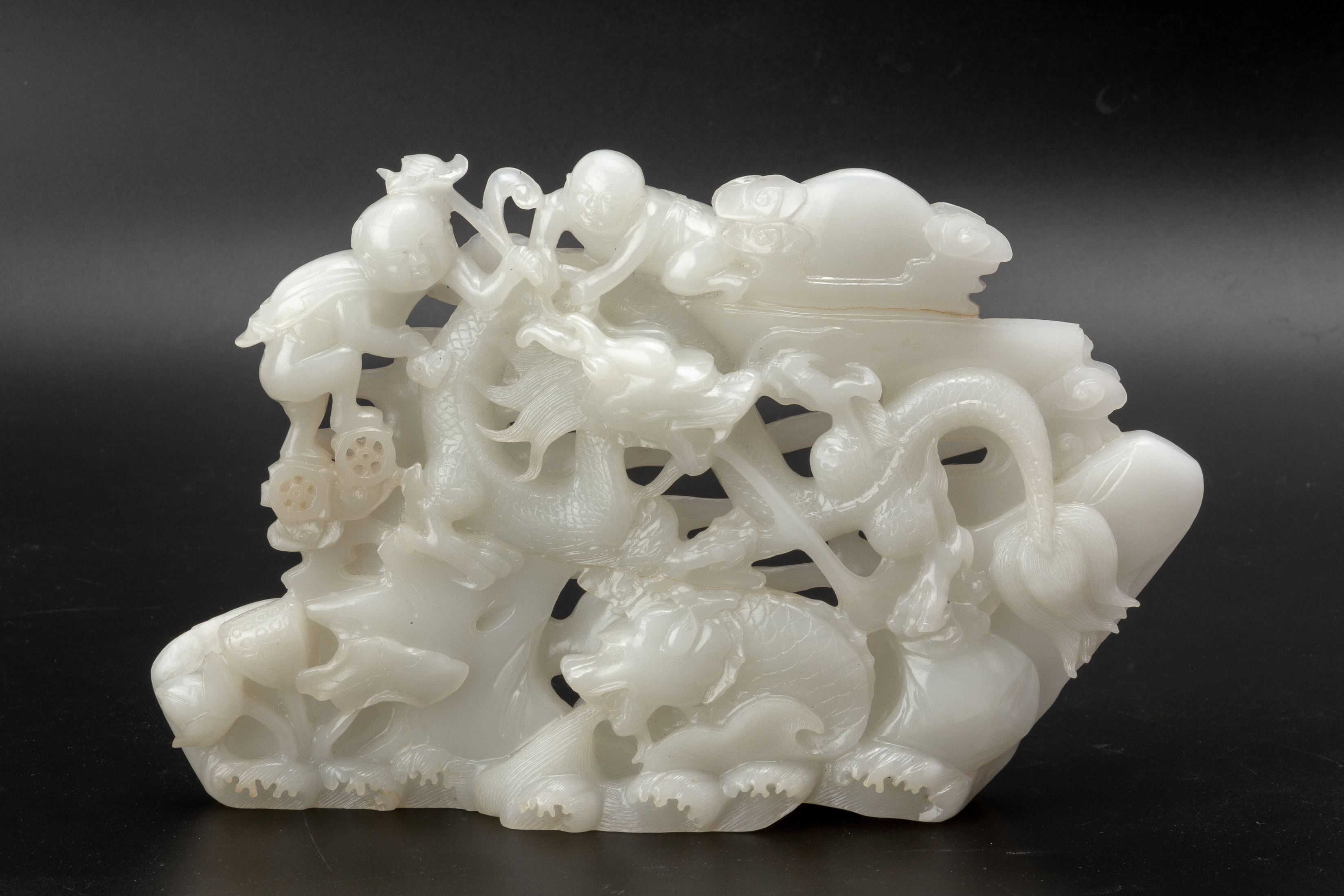 A WHITE JADE CARVING