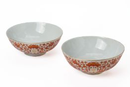 A PAIR OF IRON RED DECORATED 'LOTUS' BOWLS