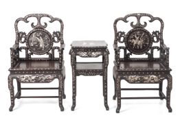 A PAIR OF MOTHER OF PEARL INLAID BLACKWOOD CHAIRS AND TABLE