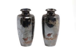 A PAIR OF JAPANESE SILVER AND MIXED METAL VASES